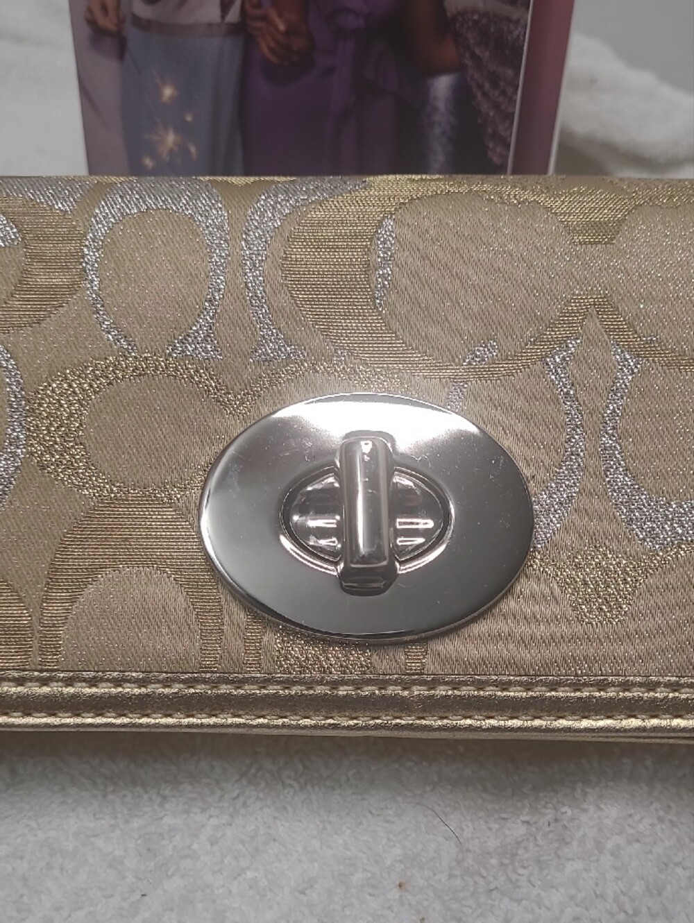 COACH Gold Metallic Signature Turnlock Wristlet - Picture 2 of 10